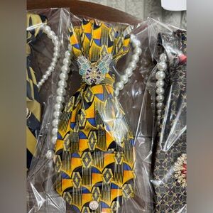 UPCYCLE Yellow and Blue Geometric Tie necklace with Butterfly Brooch